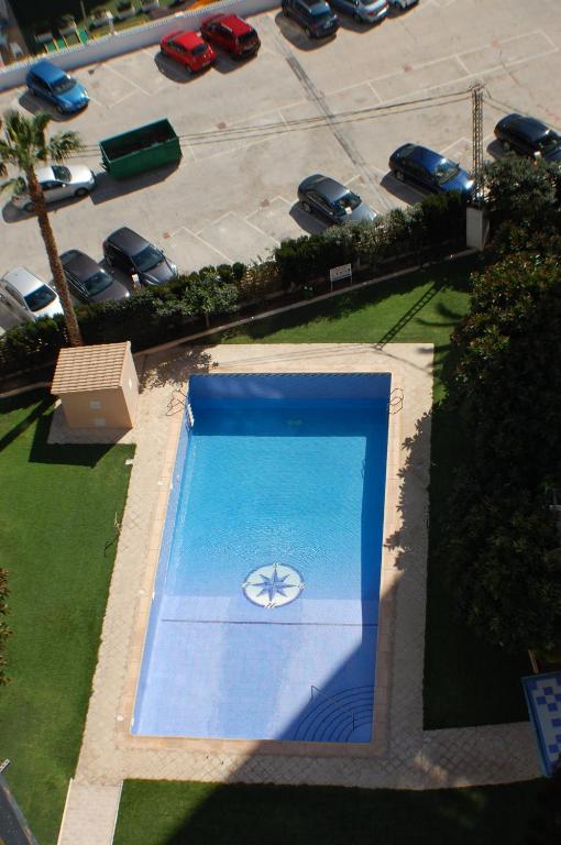 an overhead view of a swimming pool with aundai logo on it at Acacias 4 - Fincas Arena in Benidorm