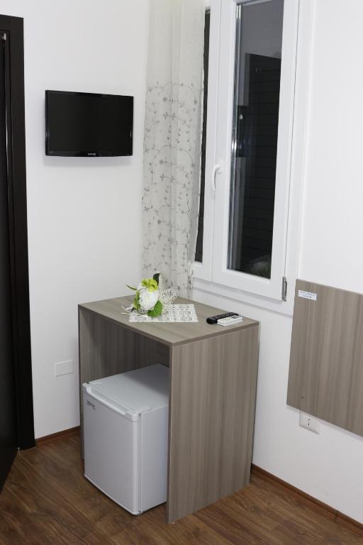 TV a/nebo společenská místnost v ubytování B&B Incanto Salento
