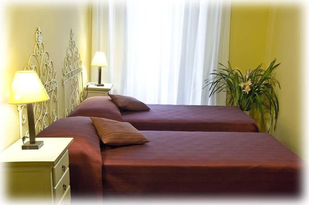 Posteľ alebo postele v izbe v ubytovaní Florence Rental