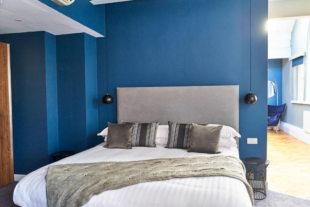 Postel nebo postele na pokoji v ubytování ABode Manchester