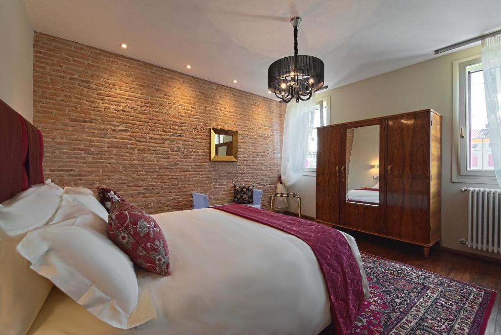 A bed or beds in a room at 28 Alla Rotonda