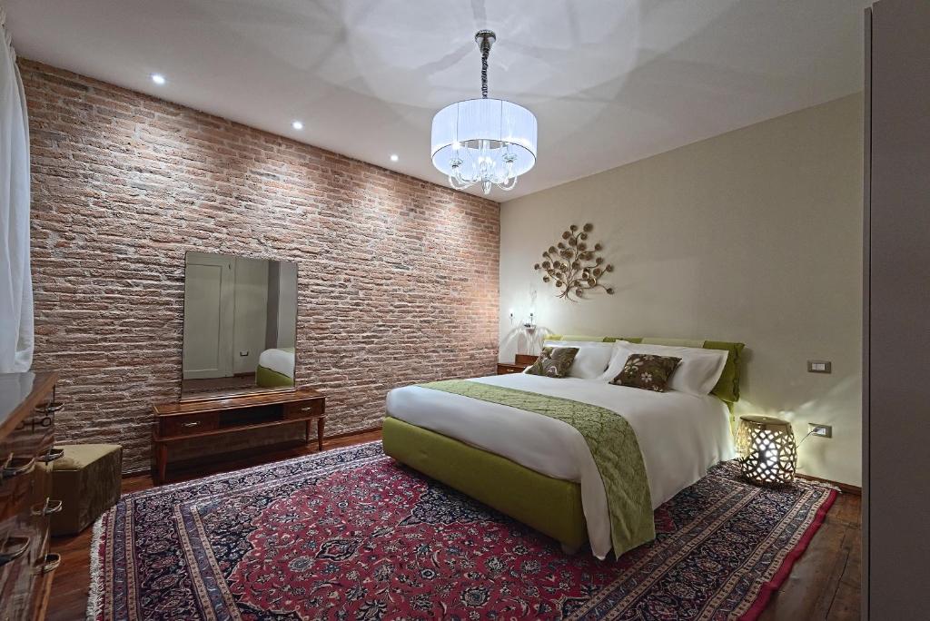 A bed or beds in a room at 28 Alla Rotonda