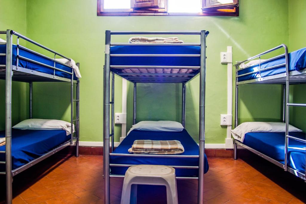 Postel nebo postele na pokoji v ubytování Hostel Santa Monaca