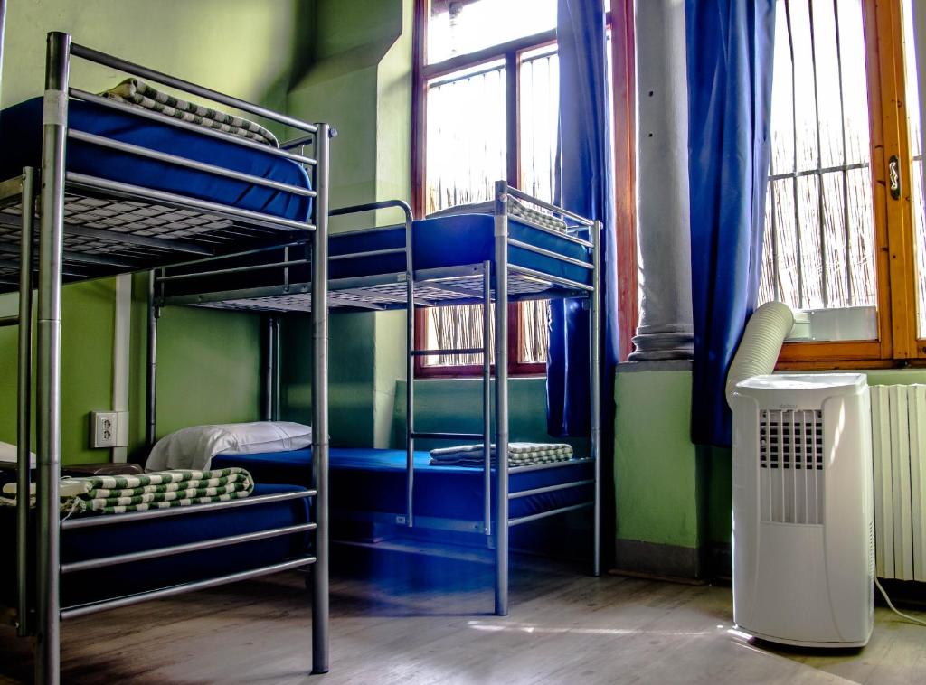 Postel nebo postele na pokoji v ubytování Hostel Santa Monaca