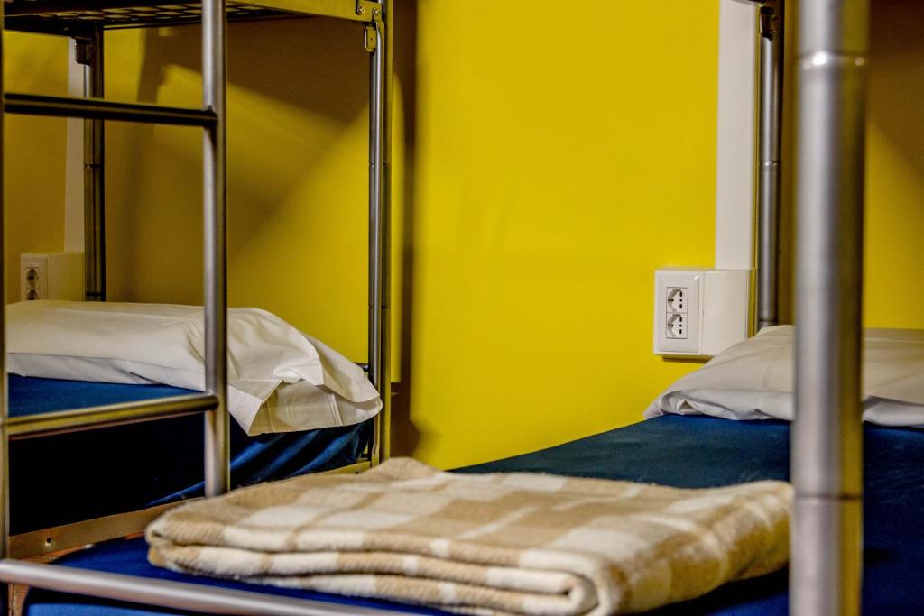 Postel nebo postele na pokoji v ubytování Hostel Santa Monaca