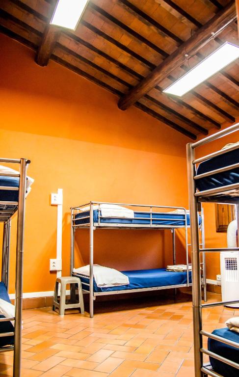 Postel nebo postele na pokoji v ubytování Hostel Santa Monaca