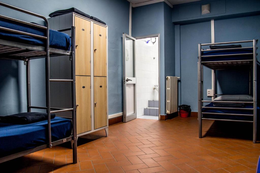 Postel nebo postele na pokoji v ubytování Hostel Santa Monaca