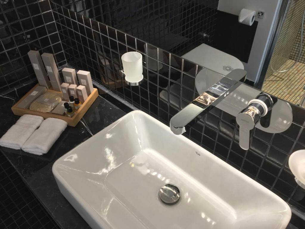 Koupelna v ubytování Four-G Hotel