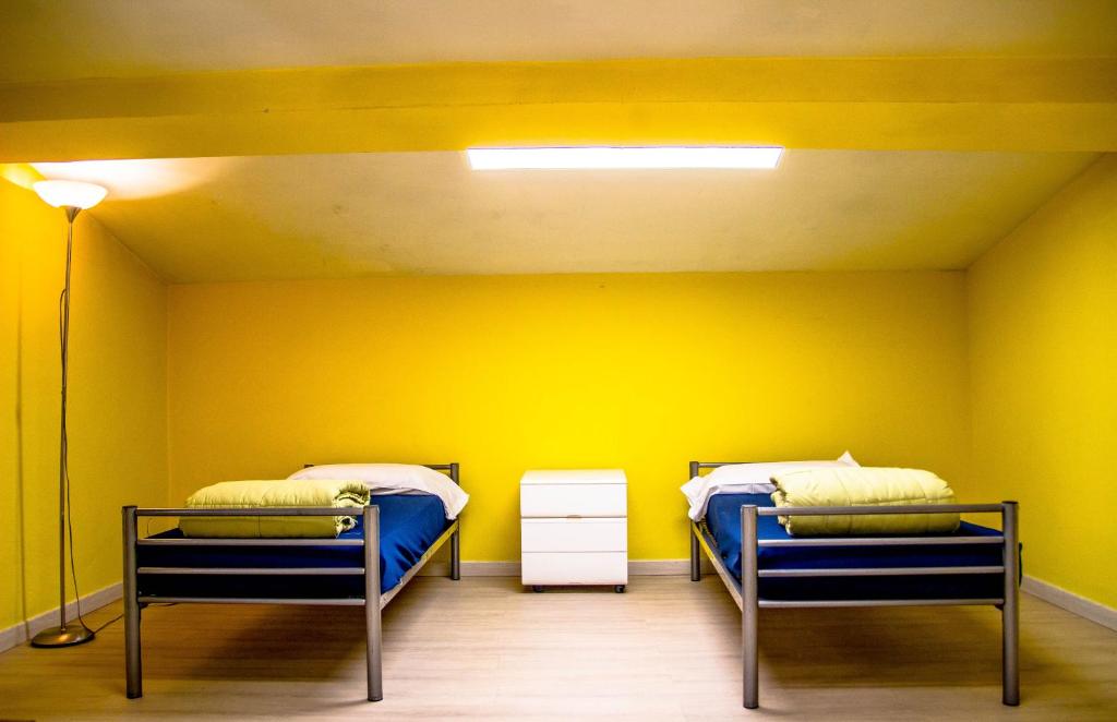 Postel nebo postele na pokoji v ubytování Hostel Santa Monaca