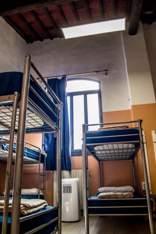 Postel nebo postele na pokoji v ubytování Hostel Santa Monaca