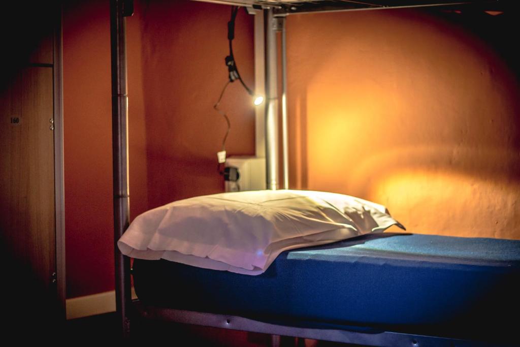 Postel nebo postele na pokoji v ubytování Hostel Santa Monaca