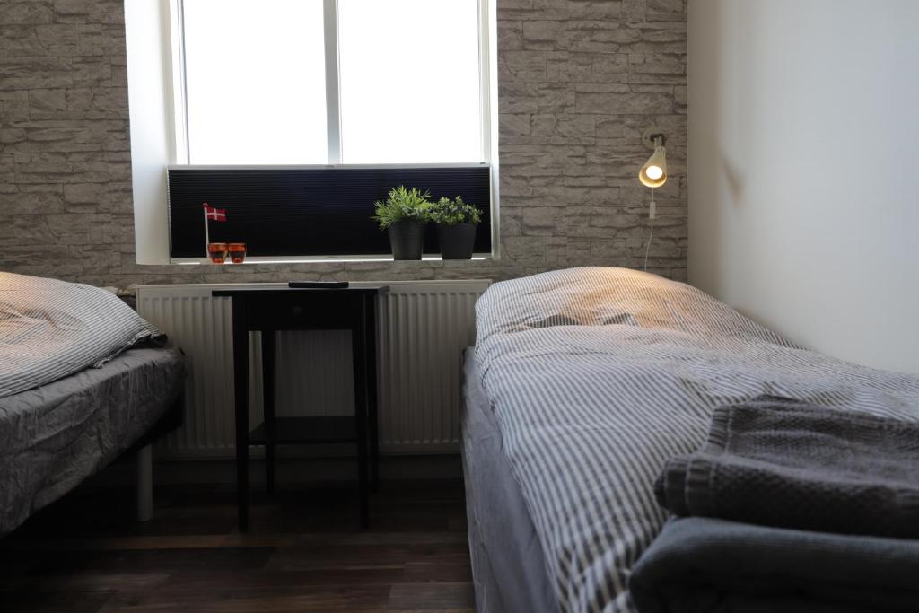 Postel nebo postele na pokoji v ubytování A-Bed