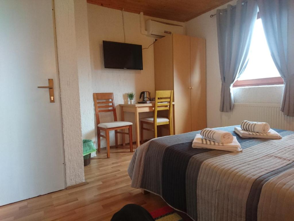 Postel nebo postele na pokoji v ubytování House Viktoria