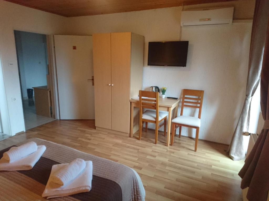 Postel nebo postele na pokoji v ubytování House Viktoria
