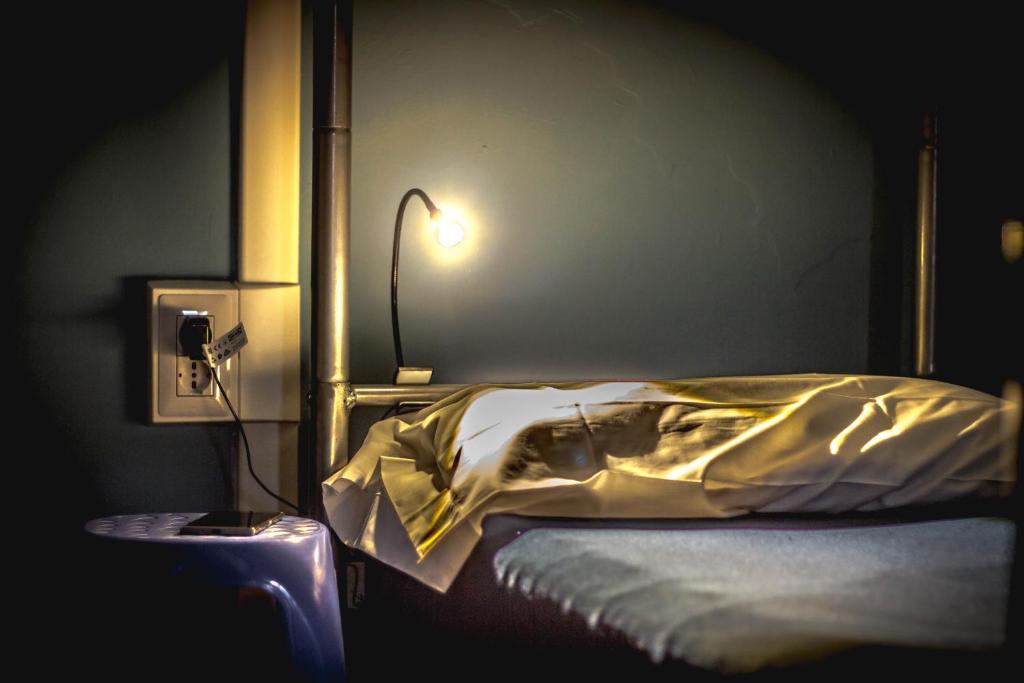 Postel nebo postele na pokoji v ubytování Hostel Santa Monaca