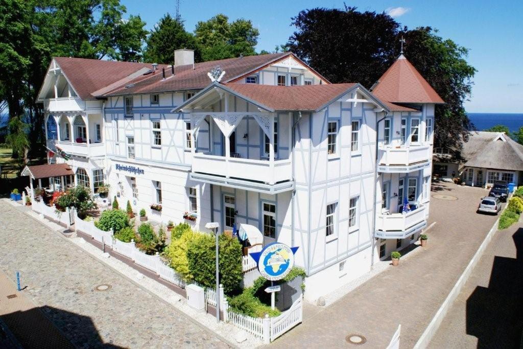 an aerial view of a large white building at "Rheinschlosschen" Villa am Meer in Göhren