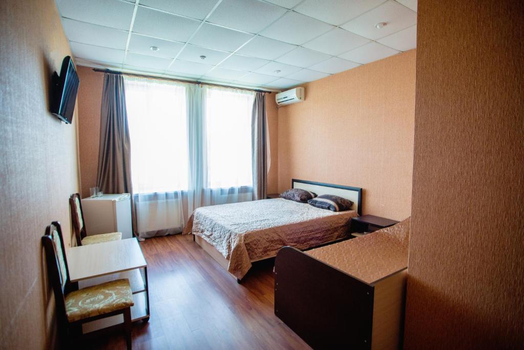 Postel nebo postele na pokoji v ubytování Art Hotel