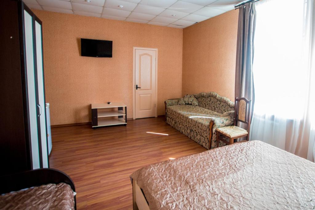 Postel nebo postele na pokoji v ubytování Art Hotel