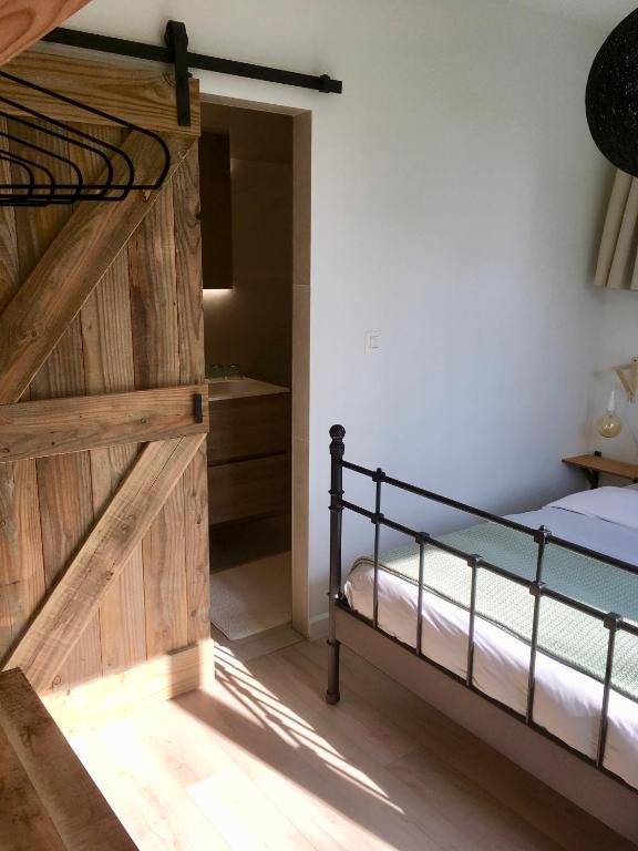 Postel nebo postele na pokoji v ubytování De Gulle Beemden