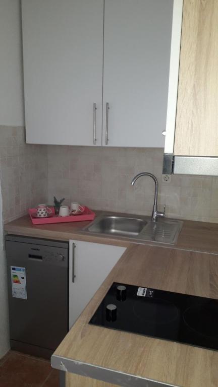 Kuchyň nebo kuchyňský kout v ubytování Apartman Sea view