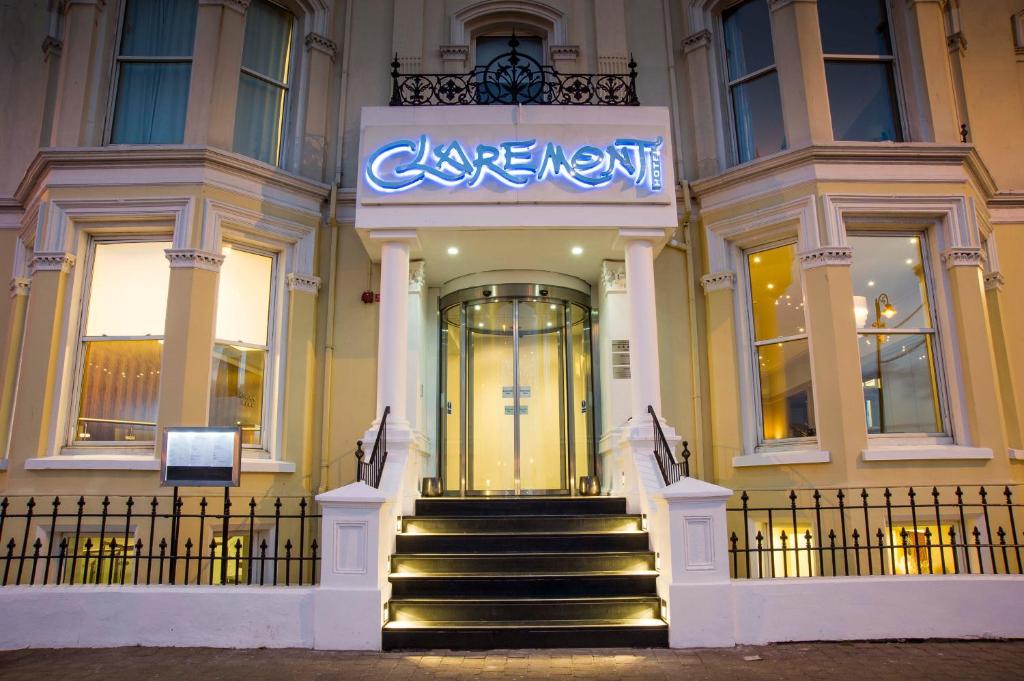 a store with a sign on the front of a building at Claremont Hotel in Douglas