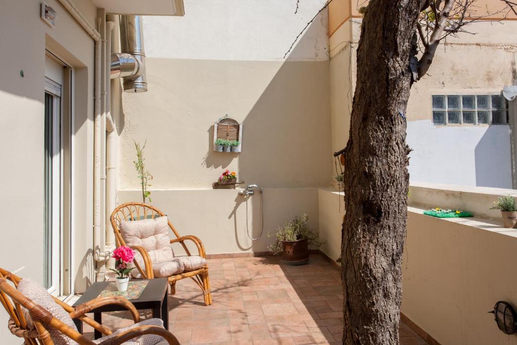 A patio or other outdoor area at Evelia Apartment