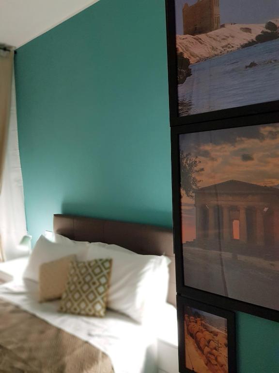 Postel nebo postele na pokoji v ubytování Gocce di Girgenti - comfort suites