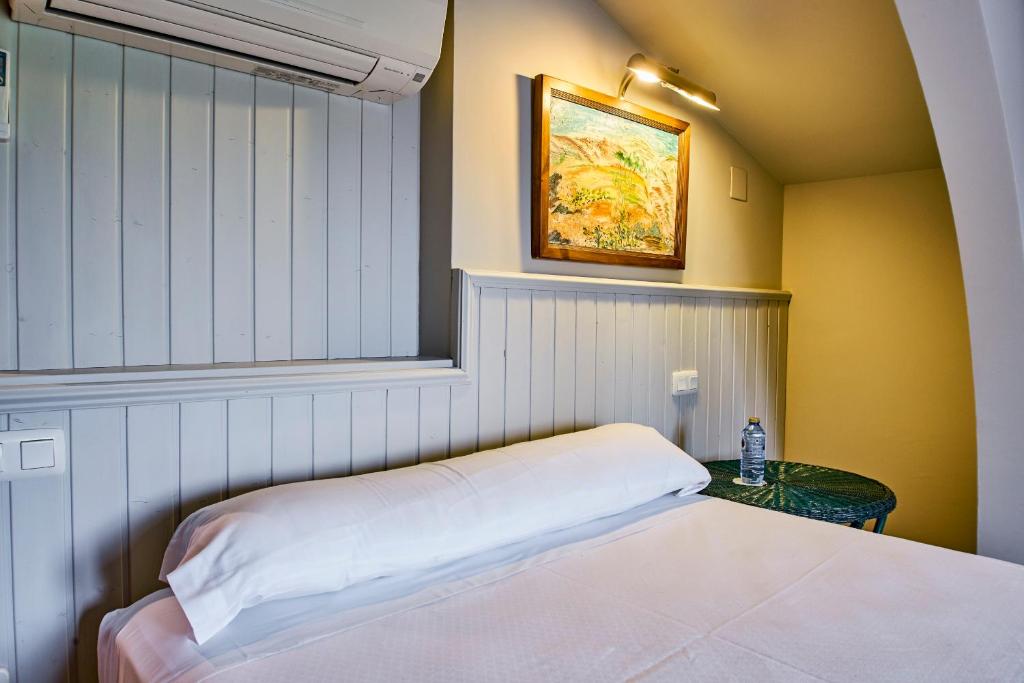 A bed or beds in a room at Sotopalacio HSR