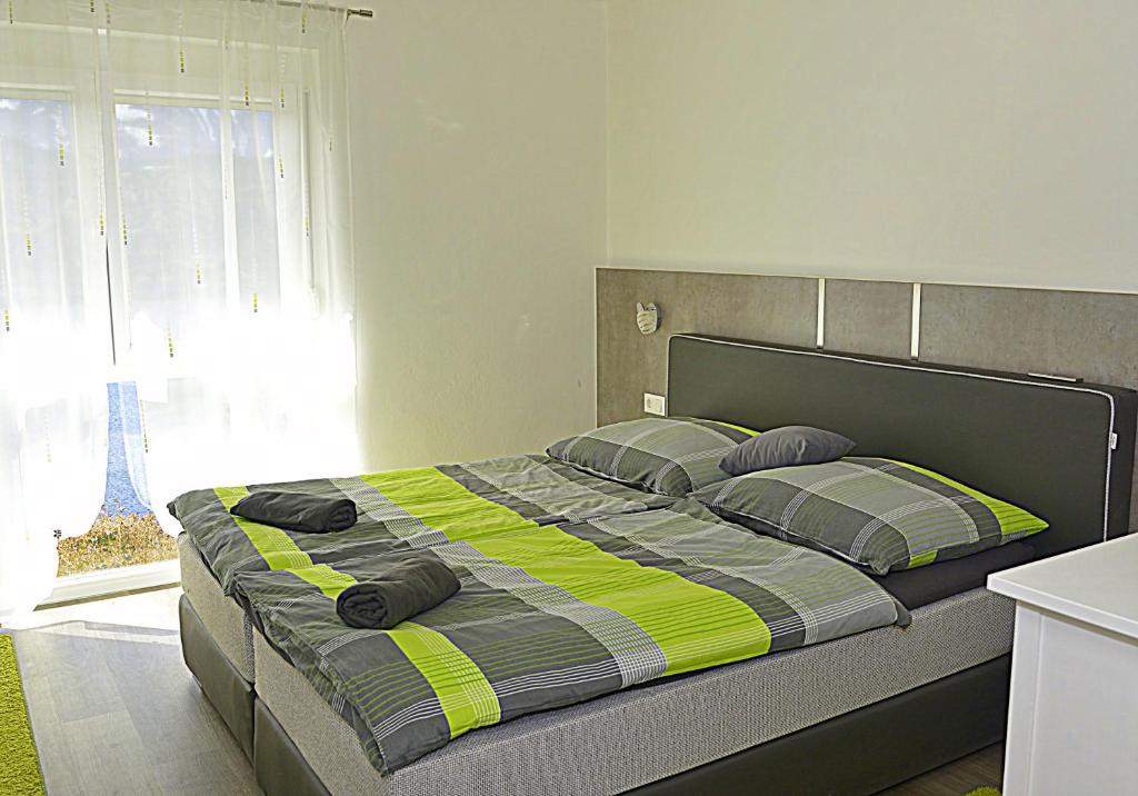 Postel nebo postele na pokoji v ubytování Ferienwohnungen Klinar