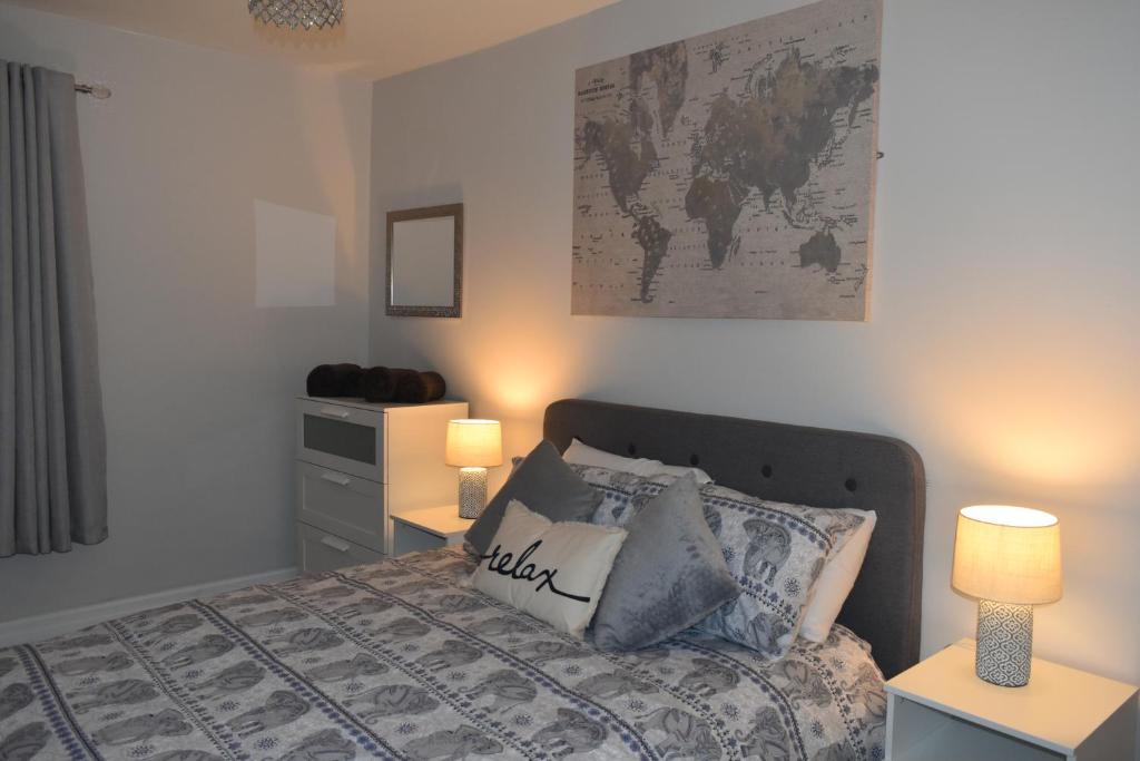 Кровать или кровати в номере Pleasure Beach House