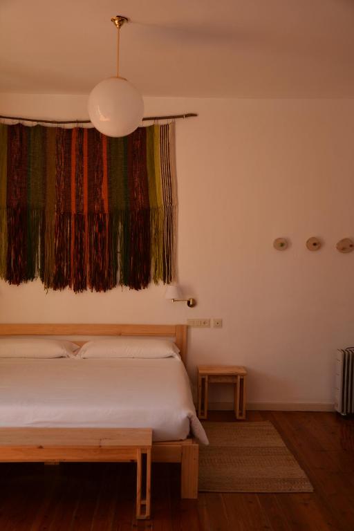 Postel nebo postele na pokoji v ubytování Posada Hoyos de Iregua