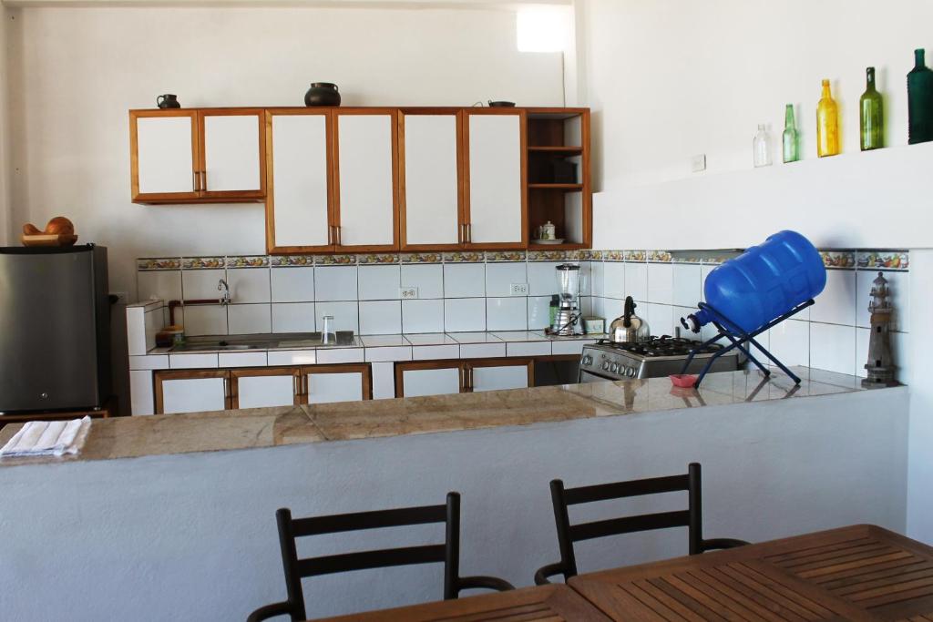 Kuchyň nebo kuchyňský kout v ubytování Posada del Mar
