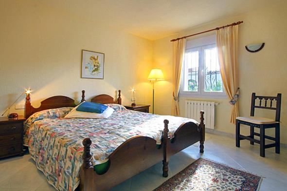 A bed or beds in a room at Casa Resa