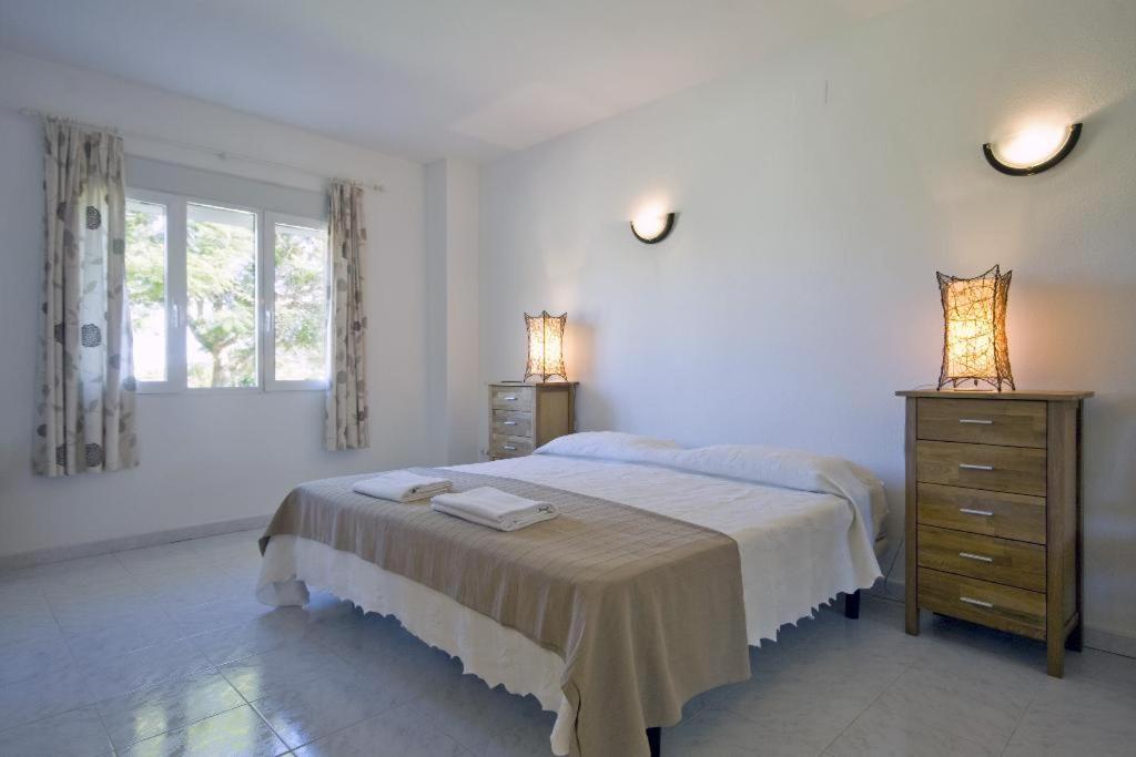 A bed or beds in a room at Villa Cora
