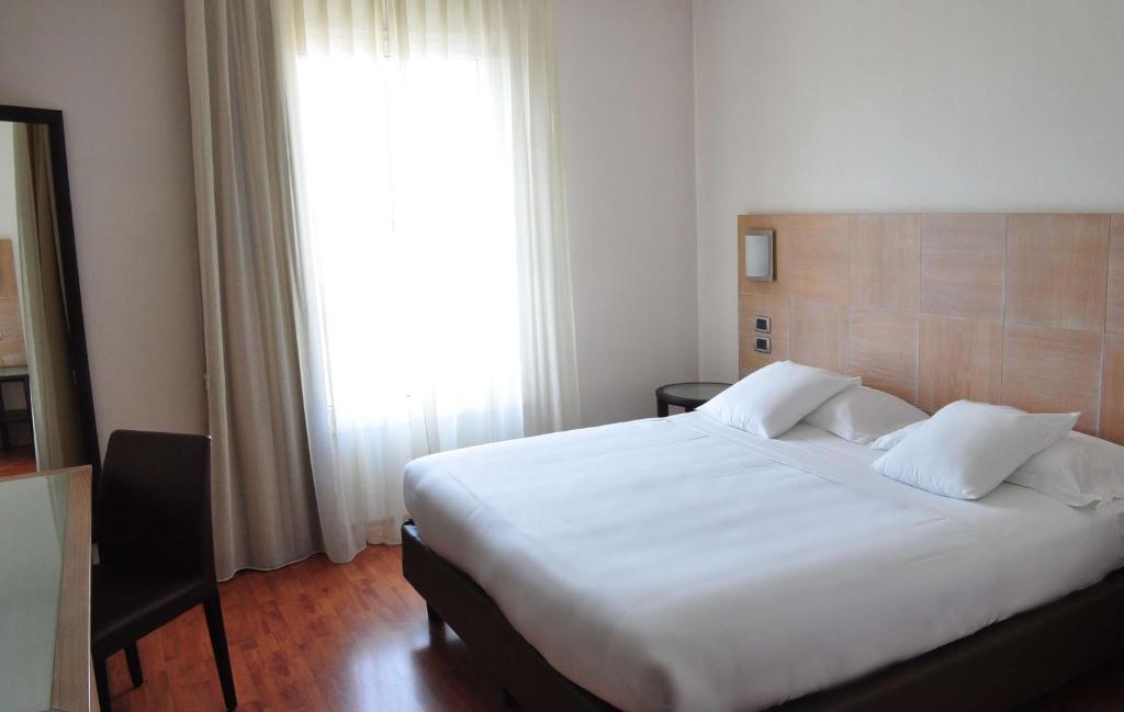 Postel nebo postele na pokoji v ubytování San Giorgio, Sure Hotel Collection by Best Western