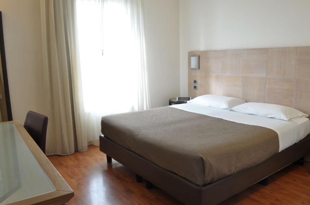 Postel nebo postele na pokoji v ubytování San Giorgio, Sure Hotel Collection by Best Western