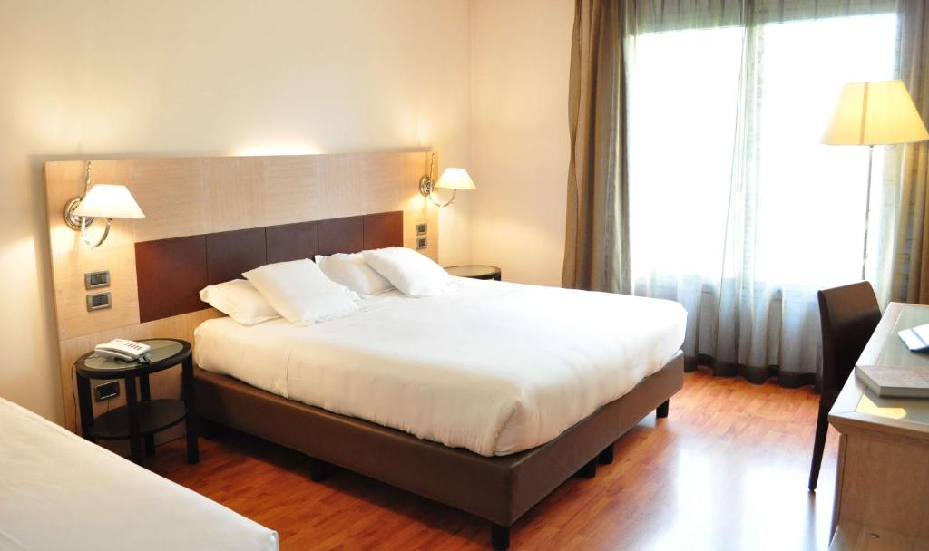Postel nebo postele na pokoji v ubytování San Giorgio, Sure Hotel Collection by Best Western