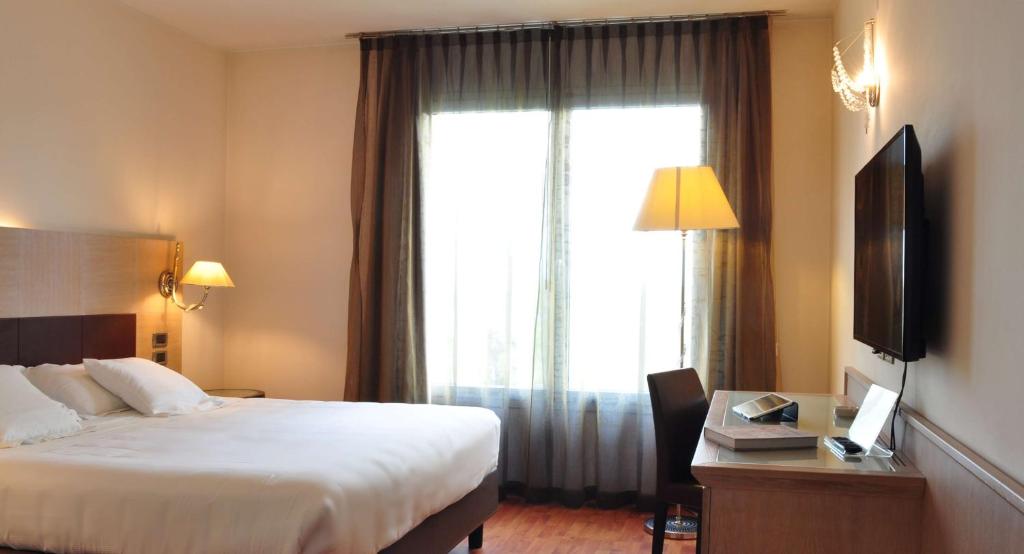 Postel nebo postele na pokoji v ubytování San Giorgio, Sure Hotel Collection by Best Western