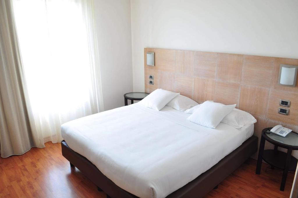 Postel nebo postele na pokoji v ubytování San Giorgio, Sure Hotel Collection by Best Western