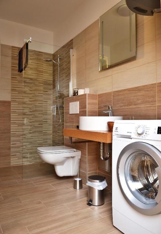 Koupelna v ubytování Apartmány Přítluky