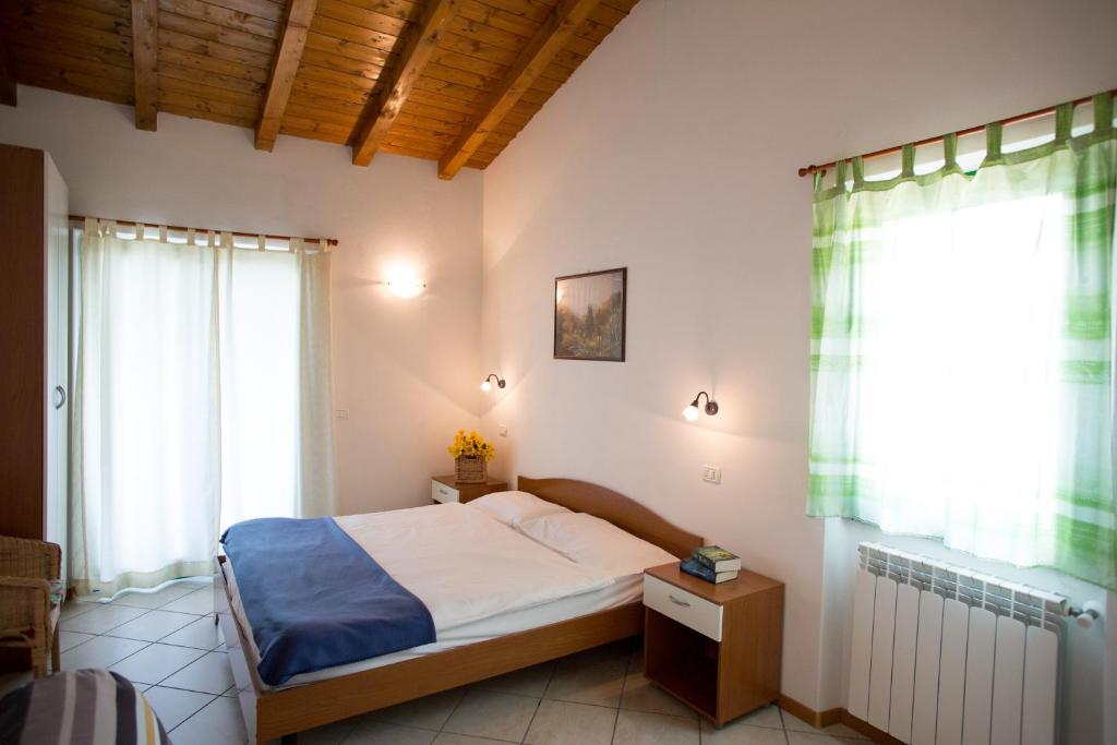 Postel nebo postele na pokoji v ubytování Hotel Panorama e Residence