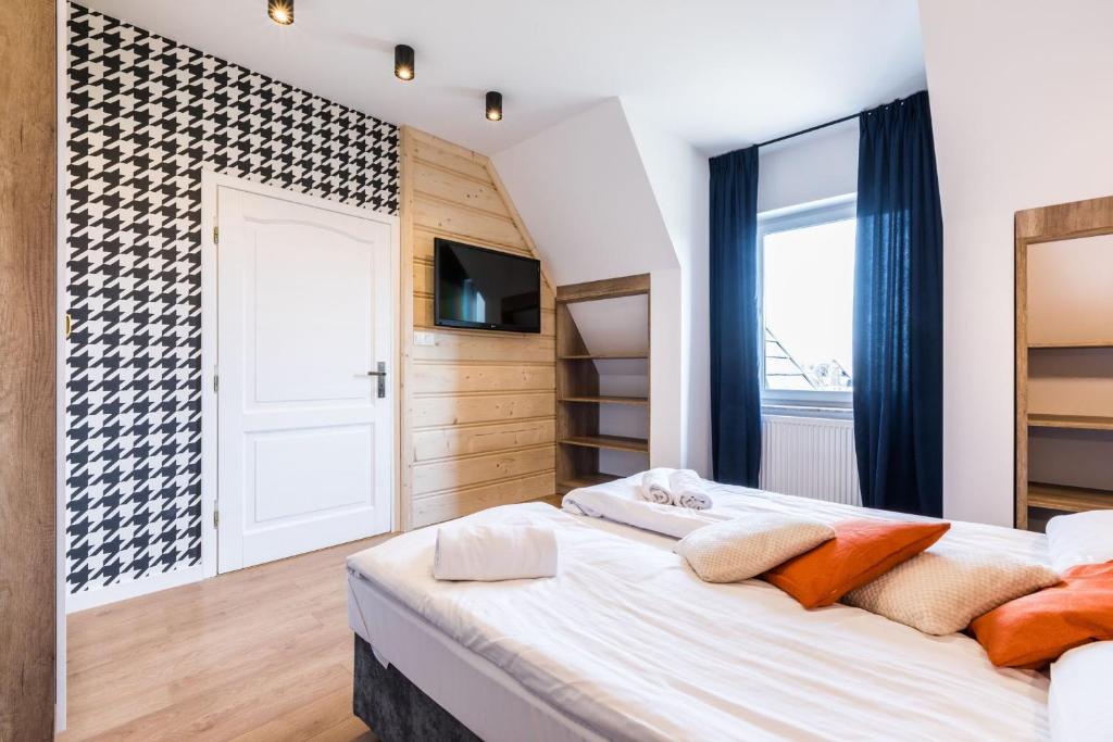 Posteľ alebo postele v izbe v ubytovaní Aparthotel Diamond SPA Family