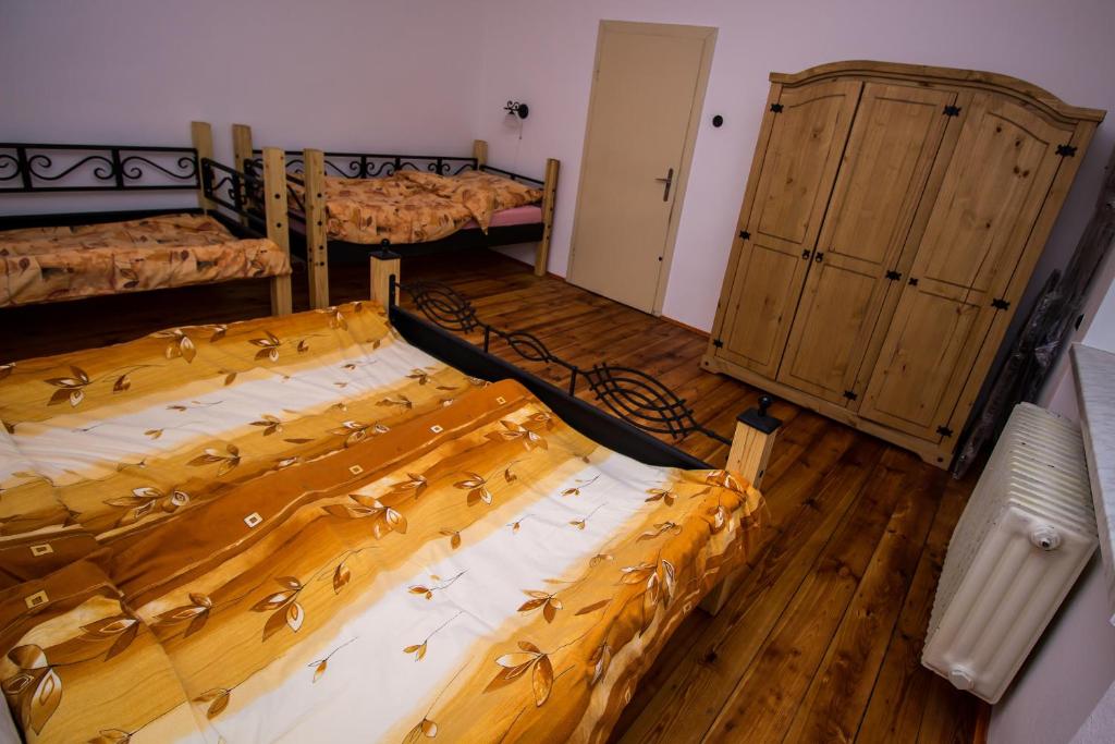 Postel nebo postele na pokoji v ubytování Rozboudovec