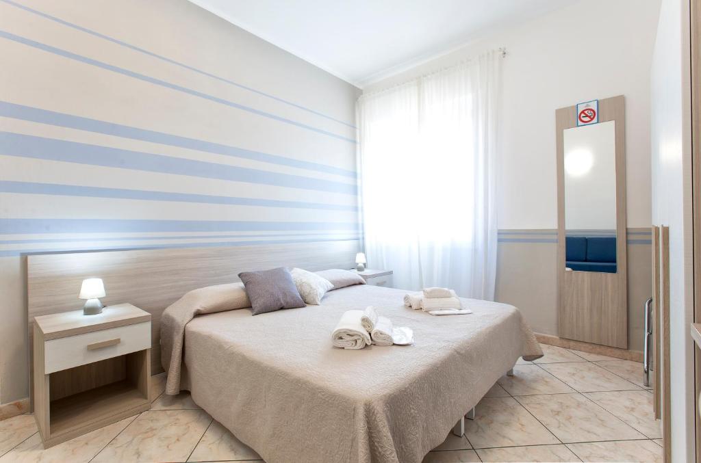 Postel nebo postele na pokoji v ubytování Alguest