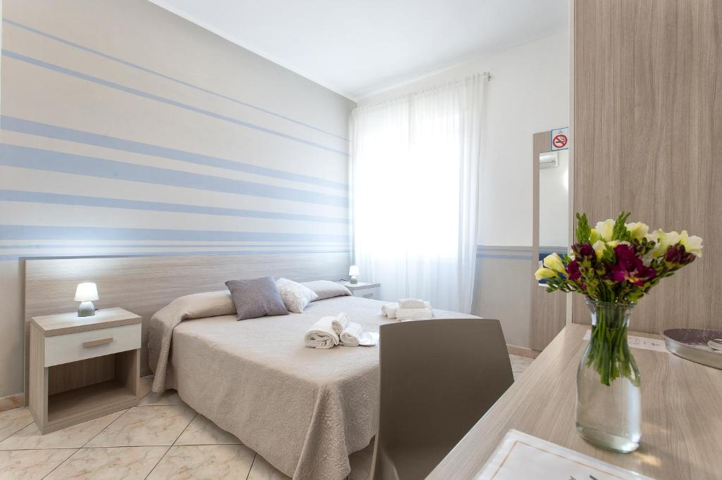 Postel nebo postele na pokoji v ubytování Alguest