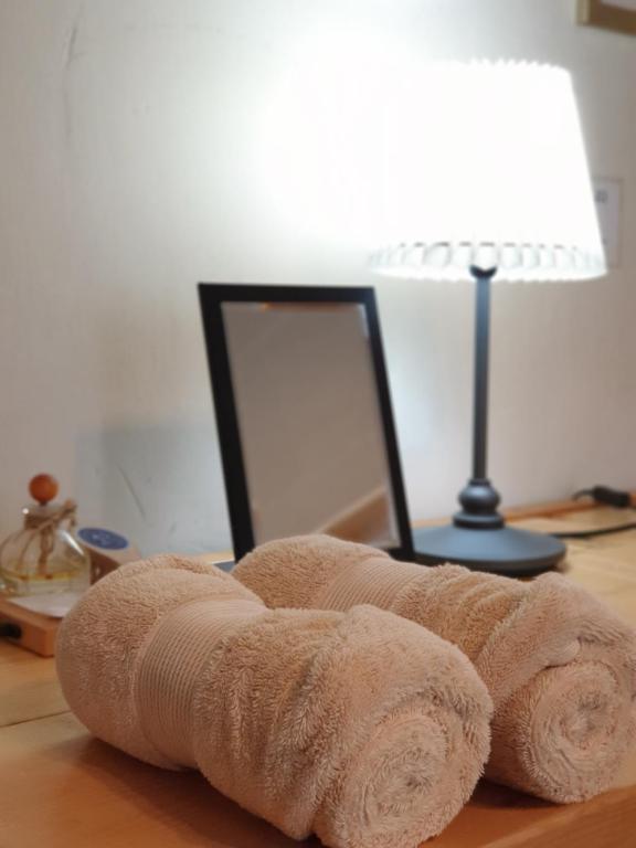 Postel nebo postele na pokoji v ubytování Tong Stay
