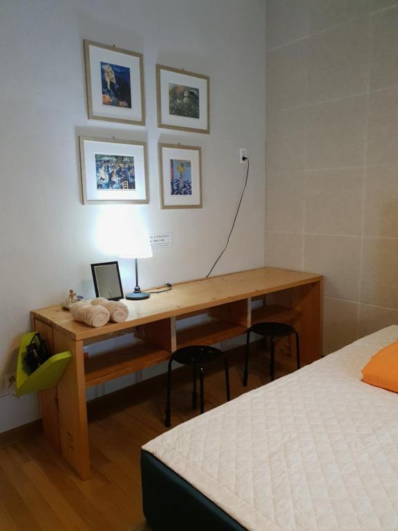 Postel nebo postele na pokoji v ubytování Tong Stay