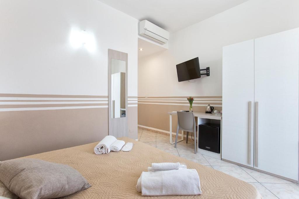 Postel nebo postele na pokoji v ubytování Alguest