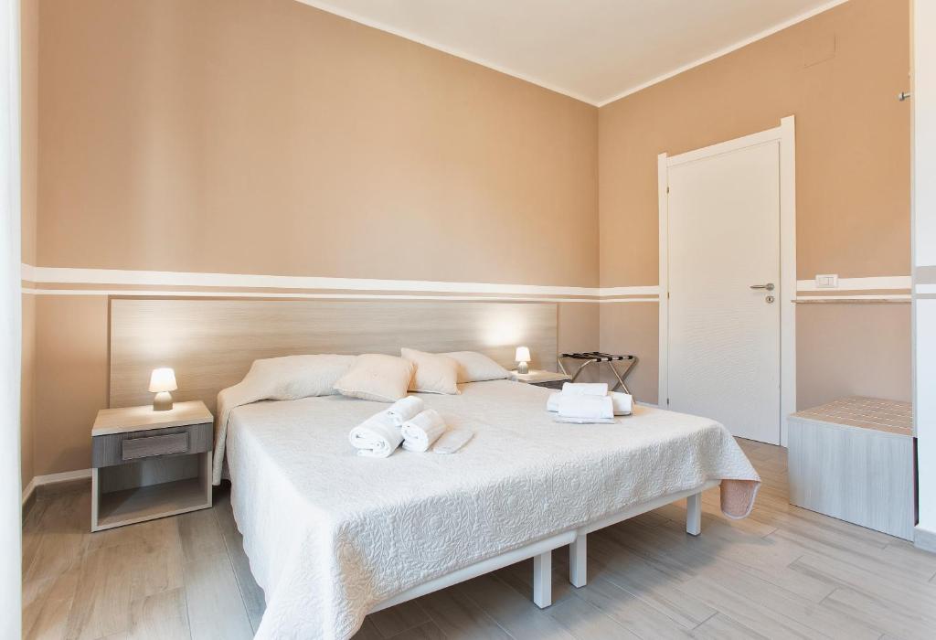 Postel nebo postele na pokoji v ubytování Alguest