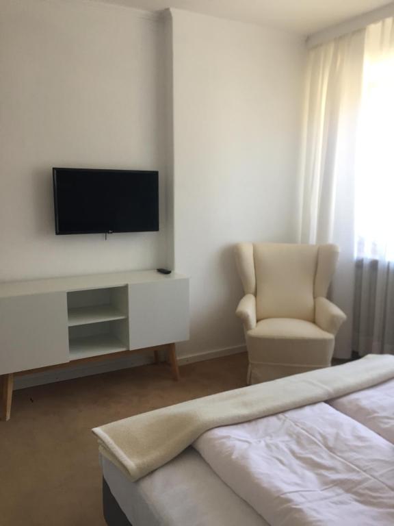 TV o dispositivi per l'intrattenimento presso Dietrichsteinerhof Apartments & Rooms